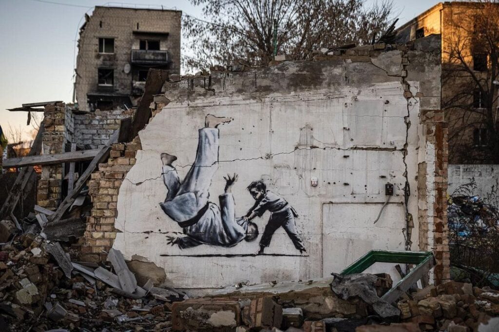 Banksy in Ukraine. A boy and a judoka